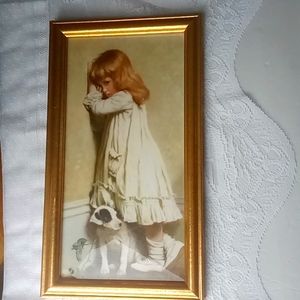Framed Picture of Girl with Dog at Wall / Corner.